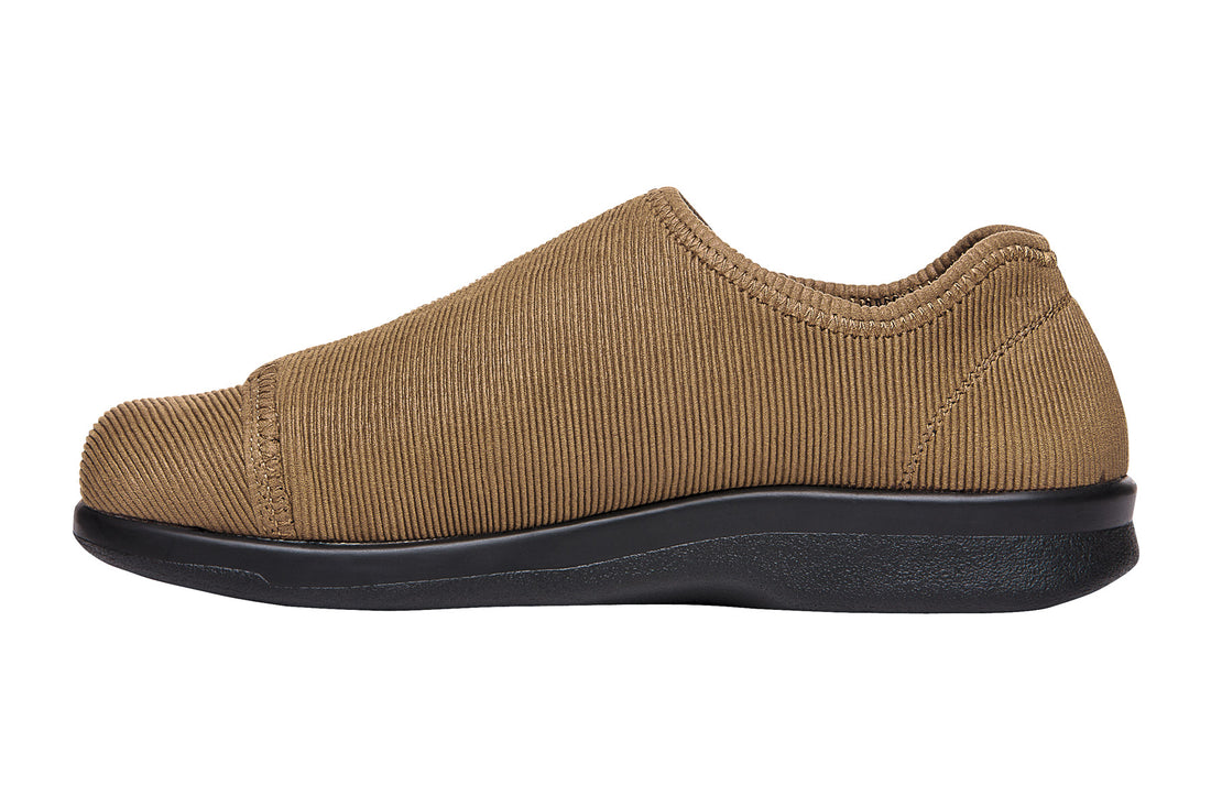 Shoe, black rubber chevron sole, cushioned footbed, Propet logo centered.