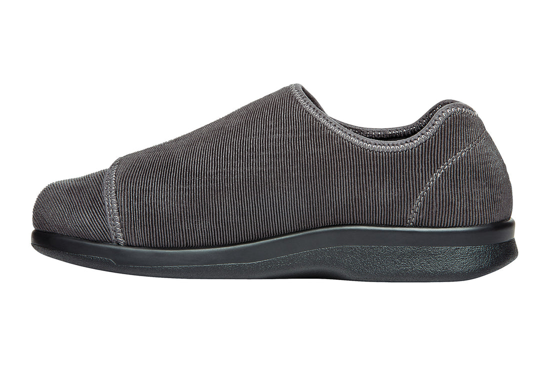 Shoe with black rubber sole, zigzag tread, cushioned footbed; Propet Cush N Foot logo at center.